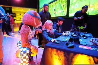 The UK Wildcat mascot observed participants in the UK and Gen.G event in New York as they tried out some of the latest games and gaming hardware from Samsung. Photo by Vinny Dusovic.
